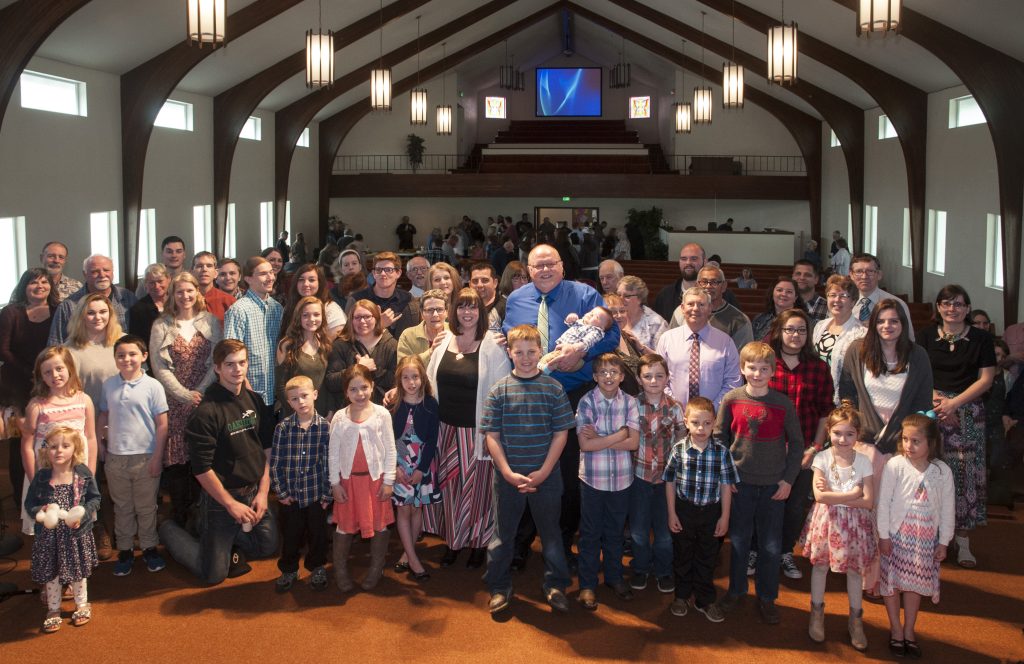 Pastor Randy & Lynn Johnson surrounded by ONC congregation